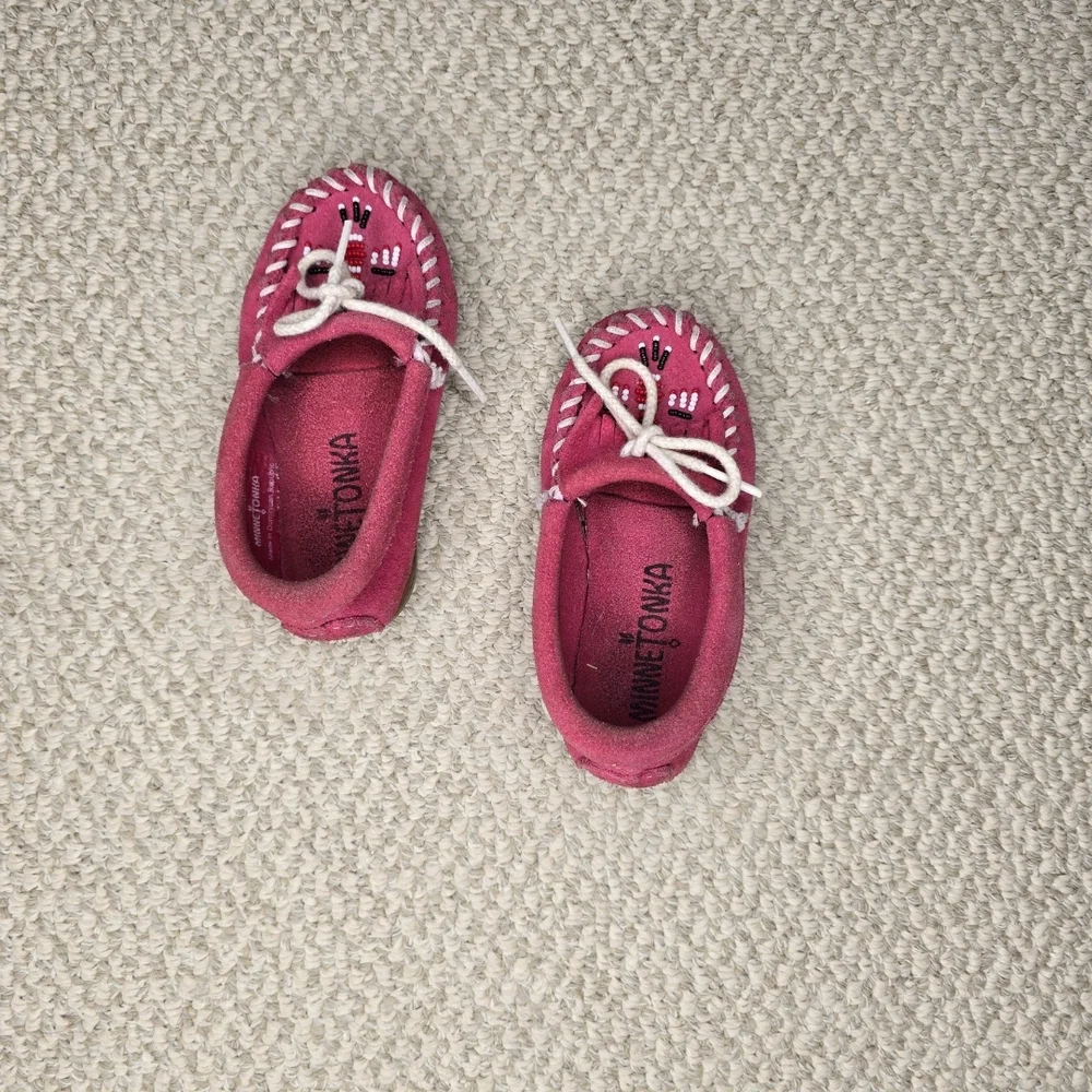 Minnetonka Beaded Thunderbird Pink Moccasins with White Bow Details